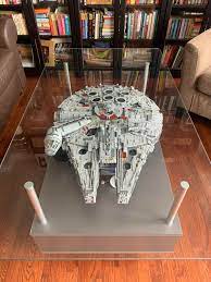 This table also has protected feet at the bottom to avoid scratching the floor or the bottom glass component of the coffee table. Using An Old Ikea Coffee Table To Display My Millennium Falcon Made Longer Tubes And Threaded Rods To Give It More Height Lego