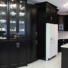 Chestnut Grove On Instagram Slick Black Cabinets With Silver Handles Complemented By An Elegant Granit Counter Black Cabinets Granite Countertops Countertops