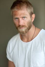 Answer =he is 38 years old (in 2021). Kaiwi Lyman Mersereau Blonde Bombshell Mens Tshirts Blonde