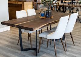 This dining table enhances the look of your dining room with its glam base and expansive surface. Metal Arrow Dining Table Base Pathway Tables