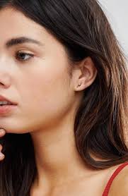 10 pairs of tiny stud and hoop earrings that look really expensive