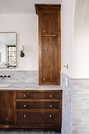 In colors and styles to match existing bathroom paint and hardware, adding a bathroom tower cabinet, or multiple bathroom tower cabinets, will give you extra storage, without taking up too much space. All About The Custom Vanities In Our Bathroom Chris Loves Julia