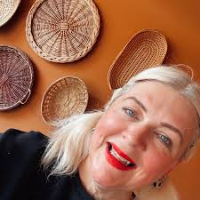 Posing in front of my basket wall! The blonde looks good against this  gorgeous @coatpaints Mezcal that I have in three rooms! 🤎💛🤍 #mezcal  #coatpaints #terracottaish #brownpaint #basketwall #chatityshopfinds  #70sstyle #blondeera #blõndeshavemorefun #