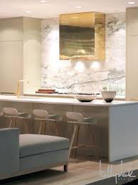 Contemporary Kitchen Brass Hood Full Height Marble Slab Backsplash Grey Cabinets Kitchen Interior Contemporary Kitchen Kitchen Marble