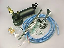 Remove the traveling arm linkage retaining bolt. Electric Windshield Wipers
