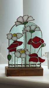 Stained Glass Frieze Mounted On A Wooden Stand Made Using Traditional Copper Foil Techniques Appr In 2020 Stained Glass Flowers Stained Glass Diy Stained Glass Decor