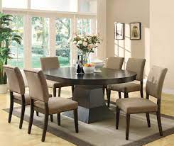 With a rich cherry finish, a smooth, contoured table top and a casual yet sophisticated veneer table design, this dining set will add a polished feel to your home. Round Dining Room Sets With Leaf Ideas On Foter