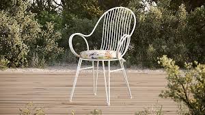 Scroll White Metal Outdoor Dining Chair With Tropic Inside Out Cushion Reviews Crate And Barrel Outdoor Dining Chairs Outdoor Dining Bistro Table Outdoor