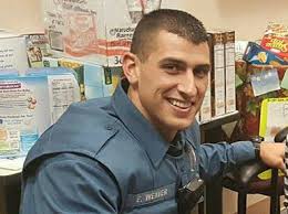 Law'n Order; Roxbury Cop Helps Push Man's Mower