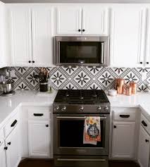 Black And White Cement Tile Backsplash Cement Tile Shop Tripoli Pattern This Black And White Kitchen With The In Stock Tripoli Patter White Tile Kitchen Backsplash White Tile Backsplash