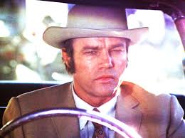 Charley Varrick" 1973 D:Don Siegel. Terrific movie about crop duster Walter  Matthau, his wife and a pal,rob a local small town bank just to make ends  meet,to his surprise there's more money