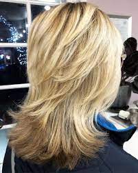 Shaggy Haircut With Flipped Up Layers Modern Shag Haircut Medium Shag Haircuts Shag Haircut
