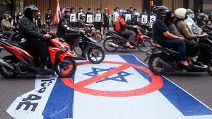 FIFA strips Indonesia of Youth World Cup Football hosting rights after Stadium Disaster and Political Controversy.