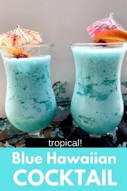 A Blue Hawaiian Cocktail Is Basically A Pina Colada That Is Blue The Perfect Summer Vacation Drink In 2020 Summer Drink Recipes Hawaiian Drinks Hawaiian Cocktails