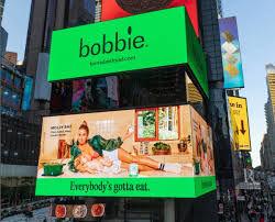 Molly Baz, Bobbie, and PEDEN+MUNK Launch NYC Billboard Promo | DesignRush