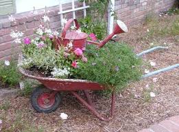 Pin By Katy Zido On Outdoors Wheelbarrow Garden Garden Containers Upcycled Planter