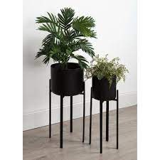 ( 4.7 ) out of 5 stars 84 ratings , based on 84 reviews current price $12.92 $ 12. Wrought Studio Coates Decorative Indoor Metal Pot Planter Plant Decor Metal Plant Stand Planter Pots