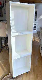 Yamazaki home 2019 2020 moving sale freestanding freestanding shelves hanging bar kitchen shelf shelves shelving tower wood accent. Diy Rolling Kitchen Appliance Storage