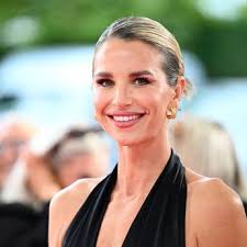 Olly Murs has a kickabout in the sunshine at Lesser Hampden