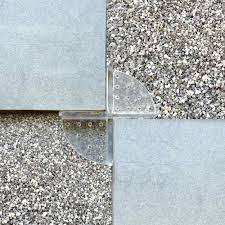 Laying vitrified tiles on floor. Plastic Tie Base With 4 Mm Tabs To Be Used With Stone And Tiles In Exterior Applications Products Profilitec