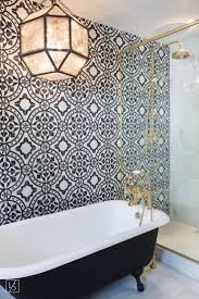 Black and white split bathroom. The 15 Best Tiled Bathrooms On Pinterest Black White Moroccan Tiled Accent Wall Clawfoot Tub Kitchenandb Bathroom Design Bathroom Interior Beautiful Bathrooms