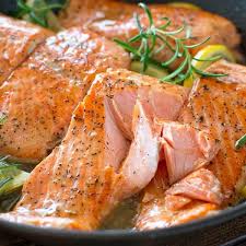 Flaky Salmon Cooked To Perfection In Rich And Lip Smacking Good Lemon Rosemary Sauce Ready In 20 Minutes Lemon Rosemary Salmon Salmon Recipes Rosemary Salmon