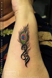 You can also see various styles of peacock tattoos. Peacock Feather Tattoo Tattoo Designs Wrist Om Tattoo Design Feather Tattoos