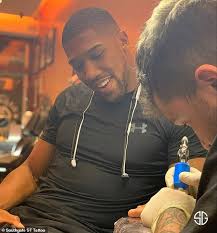 Select from premium dillian whyte of the highest quality. Anthony Joshua Gets Tattoo Of A Lion And A Forest On His Middle Finger To Cover Up Calluses Daily Mail Online