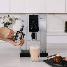 A study of carnivore tooth marks: Delonghi Dinamica Fully Automatic Coffee Maker Espresso Machine Williams Sonoma