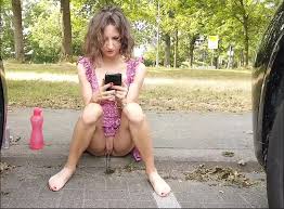 Cute girl pees under herself in public