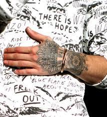 Zayn S Left Hand Showing His Mendhi Tat And His New Bracelet Detail From Adelaide 17 2 15 Hand Tattoos For Guys Left Hand Tattoo Tribal Hand Tattoos