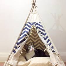 Give your cat a home he'll feel secure in with this teepee style bed which includes a variety of ornaments such as a dream catcher, tomahawk, and several others. Pet Teepee Tent Rainbow Me Blue Pet Dog Cat Beds Design Furniture Craftvillagebywm