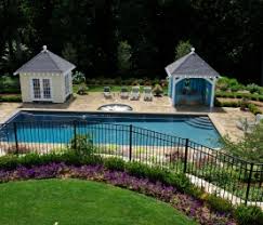 Without any trees or flowers around, it's more like a stone without a setting: The Do S And Don Ts Of Pool Landscaping Shoreline Pools