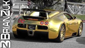 The extremely rare convertible veyron grand sport, with only 150 ever made, originally started off with a white paint scheme but was sent to dubai for a makeover. Gold Bugatti Veyron Youtube