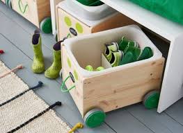 A Decorated Wooden Box On Wheels Under A White Bench Keeps Childrens Shoes Organized Kids Furniture Ikea Kids Bedroom Furniture