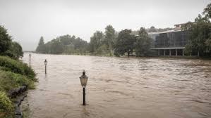 A river flood occurs when water levels rise over the top of river banks due to excessive rain from tropical systems making landfall, persistent thunderstorms over the same area for extended periods of time, combined rainfall and snowmelt, or an ice jam. I1on0dx47yux8m