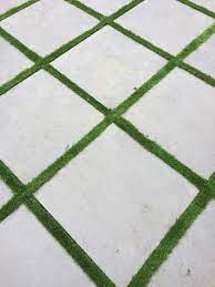 Paving Stones Set In A Diamond Shape With Artificial Grass From Garden Force Grass Paving Paving Pattern Pavers Backyard