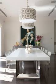 Deluxe dining room with a round dining table and purple velvet chairs that sit on a patterned area rug. Contemporary Dining Room By Massimo Interiors Via Houzz What An Excellent Use Of An Anthony Van D Rustic Dining Room Sets Dining Room Cozy Modern Dining Room