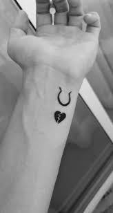The fairytale locket tattoo here shows a wonderful fantasy land within the heart. My Horseshoe And Broken Heart Lilpeep