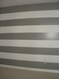 Pin By Sarah Thomas On Baby Boy S Nursery Grey And White Striped Wall Kids Bedroom Paint Striped Wall