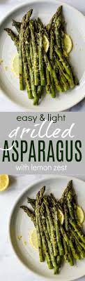 Grilled Asparagus Topped With Fresh Lemon Zest An Easy Paleo Side Dish That Screams Summer And Takes Minutes To Ma Recipes Grilled Asparagus Paleo Side Dishes