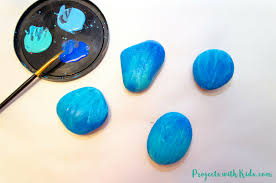 Stone painting rock painting diy painting painting & drawing rock and pebbles kindness rocks rocky road old cartoons garden crafts. How To Draw Mermaid Scales On Painted Rocks Projects With Kids