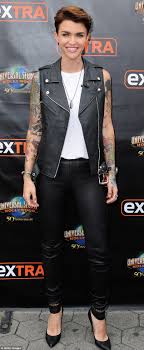 Ruby Rose brags she has more tattoos than look-a-like Justin Bieber | Daily  Mail Online