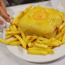 Put the sandwich on a plate and place the 2 slices of cheese on top. Watch Traveling To Porto Portugal S And Trying The Iconic Francesinha Sandwich Eater