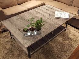 I then glued down 25 square mirrors from dollar tree with liquid nail. Diy Pallet Industrial Coffee Table With Shelf 101 Pallets