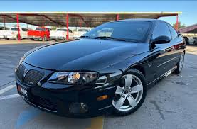 Image result for Arrival Blue 2004 Pontiac