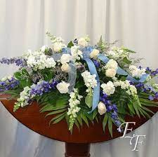 But proper funeral flower etiquette explains that only the immediate family would send this type of arrangement. Blue White Casket Spray Ef 207 B Essex Florist Greenhouses Inc
