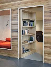 The first bookcase on the lower level adjacent to the circular staircase is a hidden door that leads to the. Top 50 Best Hidden Door Ideas Secret Room Entrance Designs