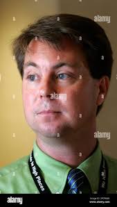 Don Krupp, chief of the vehicle analysis branch at Marshall Space Flight  Center, talks about the design of the next generation moon rockets while  talking with a group of journalists, Thursday, Aug.