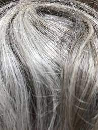 How To Naturally Brighten Gray Hair Keep It That Way Quicksilverhair Brighten Gray Hair Dry Gray Hair Grey Hair Turning Yellow